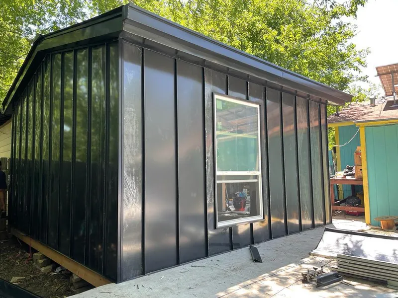 Black standing seam metal wall panels for Metal Roof Installation in Topeka