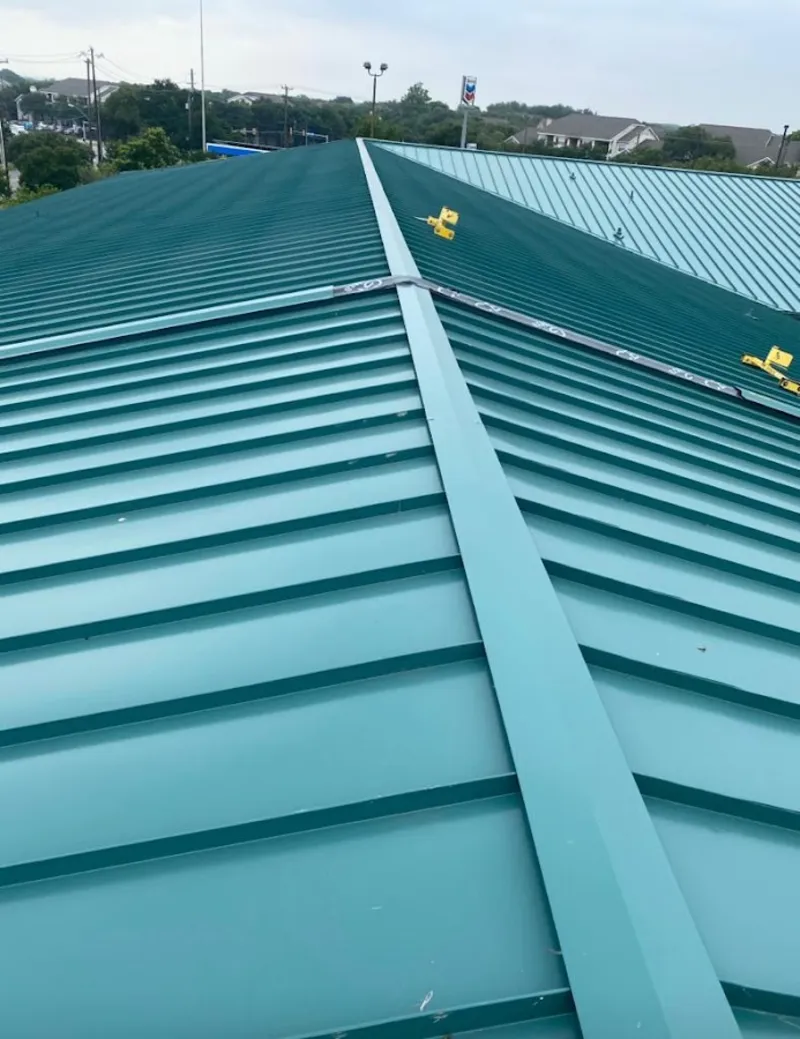 Green commercial metal roof ridge and valley for Metal Roof Repair in Topeka