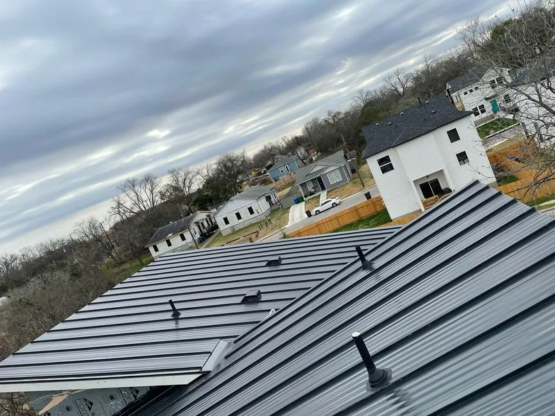 Standing seam metal roof panels with vents for Skylight Repair in Topeka